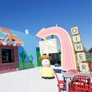 The entrance to Miss Rabbit's Diner at Peppa Pig Theme Park in Dallas Fort Worth. The colorful, charming diner welcomes guests with its playful design, featuring Miss Rabbit's signature branding and bright, inviting decor.