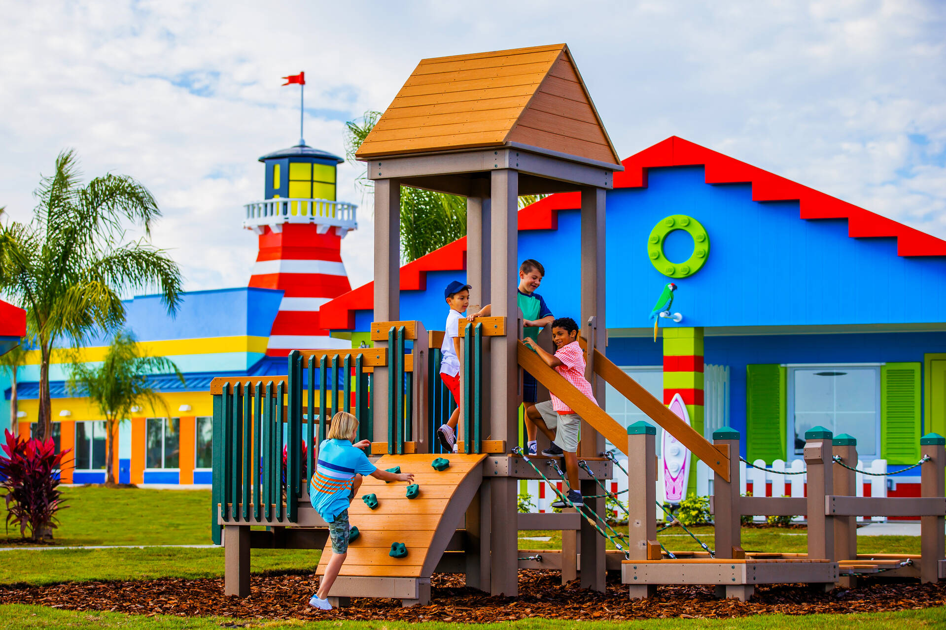 Boys Play at an Outside Beach Retreat Playground